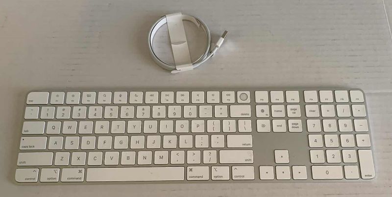 Photo 1 of APPLE MAGIC KEYBOARD WITH NUMBER PAD TOUCH ID WITH LIGHTNING CORD