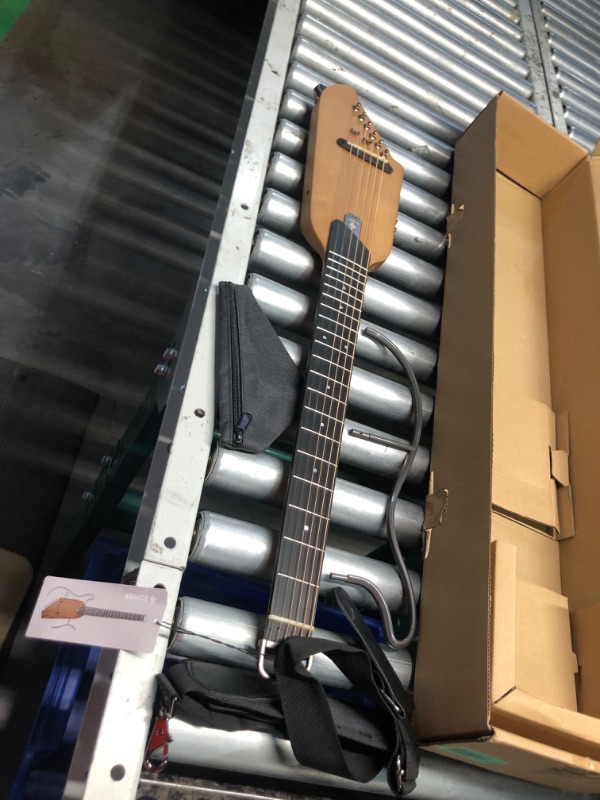 Photo 8 of ***USED - UNABLE TO TEST - LIKELY MISSING PARTS***
Donner HUSH-I Guitar For Travel - Portable Ultra-Light and Quiet Performance Headless Acoustic-Electric Guitar, Maple Body with Removable Frames, Gig Bag, and Accessories