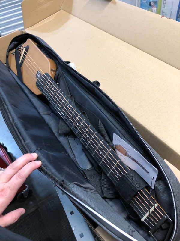 Photo 2 of ***USED - UNABLE TO TEST - LIKELY MISSING PARTS***
Donner HUSH-I Guitar For Travel - Portable Ultra-Light and Quiet Performance Headless Acoustic-Electric Guitar, Maple Body with Removable Frames, Gig Bag, and Accessories