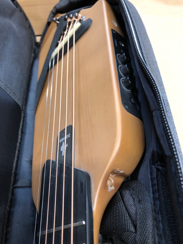 Photo 3 of ***USED - UNABLE TO TEST - LIKELY MISSING PARTS***
Donner HUSH-I Guitar For Travel - Portable Ultra-Light and Quiet Performance Headless Acoustic-Electric Guitar, Maple Body with Removable Frames, Gig Bag, and Accessories