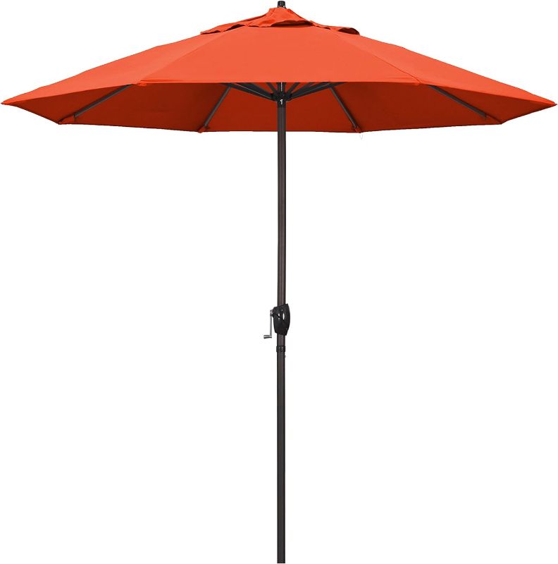 Photo 1 of ***USED - LIKELY MISSING PARTS - UNABLE TO VERIFY FUNCTIONALITY***
California Umbrella 9' Round Aluminum Market Umbrella, Crank Lift, Auto Tilt, Bronze Pole, Sunset Olefin