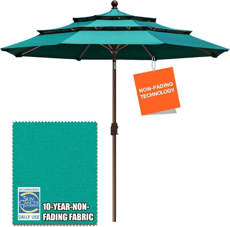 Photo 1 of ***USED NOT TO TEST*** EliteShade USA 10-Year-Non-Fading 9Ft 3 Tiers Market Umbrella Patio Umbrella Outdoor Table Umbrella with Ventilation, Navy Blue Navy Blue 9ft