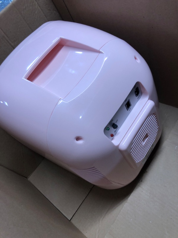 Photo 2 of ***USED - POWERS ON - UNABLE TO TEST FURTHER***
Frigidaire EFMIS462 Retro 12-Can Mini Personal Fridge Portable Cooler for Car, Office, Bedroom, Dorm Room, or Cabin, 11.22"D x 12.6"W x 12.6"H, Pink Pink Cooler