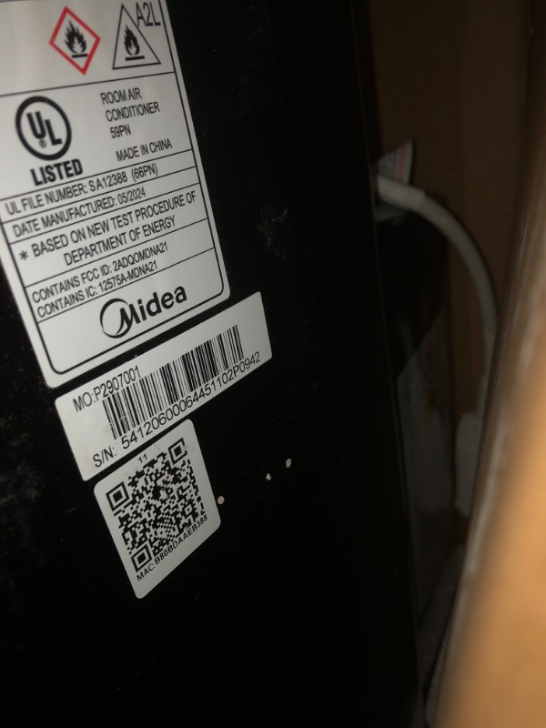 Photo 5 of **MINOR DAMAGE PREV USED PARTS**
Midea Duo 14,000 BTU (12,000 BTU SACC) High Efficiency Inverter, Ultra Quiet Portable Air Conditioner, Cools up to 550 Sq. Ft., Works with Alexa/Google Assistant, Includes Remote Control & Window Kit Black 14,000 BTU