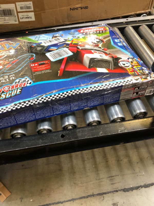 Photo 3 of Carrera GO!!! 63514 Official Licensed PAW Patrol Battery Operated 1:43 Scale Slot Car Racing Toy Track Set with Jump Ramp Featuring Chase and Marshall for Kids Ages 5 Years and Up (20063514)