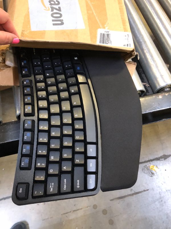Photo 2 of Amazon Basics Ergonomic Wireless Keyboard Mouse Combo - QWERTY - Black