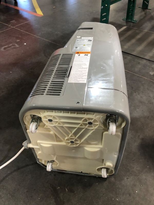 Photo 5 of ***USED - DAMAGED - SEE COMMENTS***
GE 10,500 BTU Portable Air Conditioner for Medium Rooms up to 450 sq ft., 3-in-1 with Dehumidify, Fan and Auto Evaporation, Dual Hose Compatible, Included Window Installation Kit, Grey