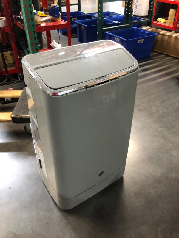 Photo 8 of ***(MINOR DAMAGE/ SEE NOTES) ***
GE 7,500 BTU Smart Portable Air Conditioner for Medium Rooms up to 300 sq ft, Gray