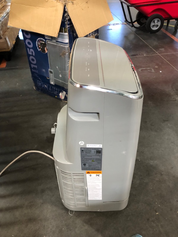 Photo 6 of ***(MINOR DAMAGE/ SEE NOTES) ***
GE 7,500 BTU Smart Portable Air Conditioner for Medium Rooms up to 300 sq ft, Gray