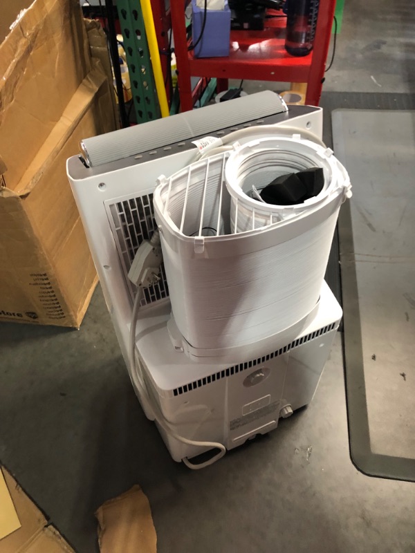 Photo 4 of ***USED - NO PACKAGING - POWERS ON - UNABLE TO TEST FURTHER - REMOTE MISSING - OTHER PARTS LIKELY MISSING AS WELL***
Midea Duo 14,000 BTU (12,000 BTU SACC) High Efficiency Inverter Quiet Portable Air Conditioner,with Heat up to 550 Sq. Ft.,white, Works wi