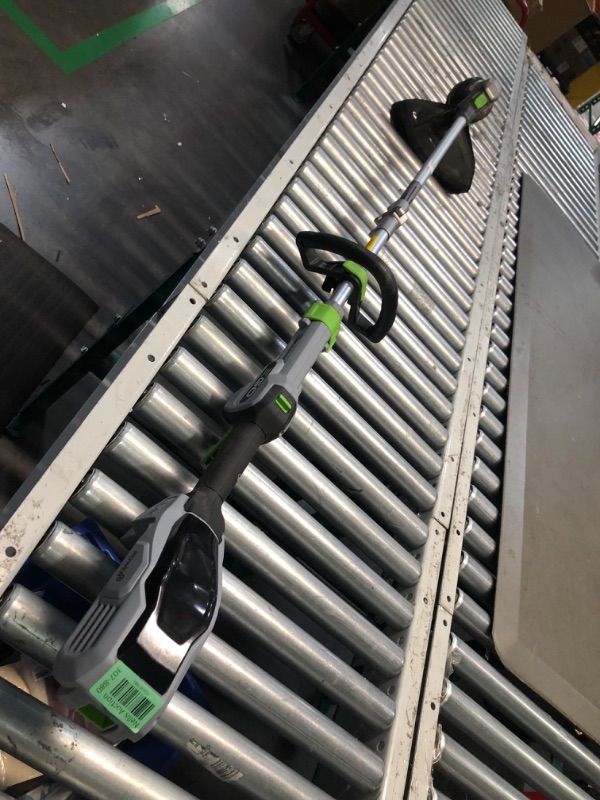 Photo 1 of ***USED AND DIRTY - NO BATTERY OR CHARGER - UNABLE TO TEST - NO PACKAGING - SEE PICTURES***
EGO Power+ ST1502SA 15-Inch 56-Volt Cordless String Trimmer with Rapid Reload and Split Shaft 2.5Ah Battery and Charger Included, Black
