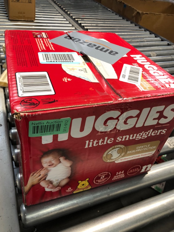 Photo 2 of ***FACTORY SEALED***
Huggies Newborn Diapers, Little Snugglers Newborn Diapers, Size Newborn (up to 10 lbs), 144 Count