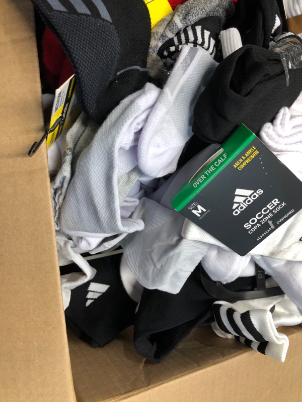 Photo 2 of ***NELLIS VARIETY BOX- MIXED ITEMS- SOLD AS IS- NONREFUNDABLE*** Mixed Lot Socks Mixed Condition 
