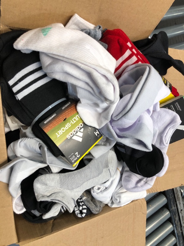 Photo 1 of ***NELLIS VARIETY BOX- MIXED ITEMS- SOLD AS IS- NONREFUNDABLE*** Mixed Lot Socks Mixed Condition 
