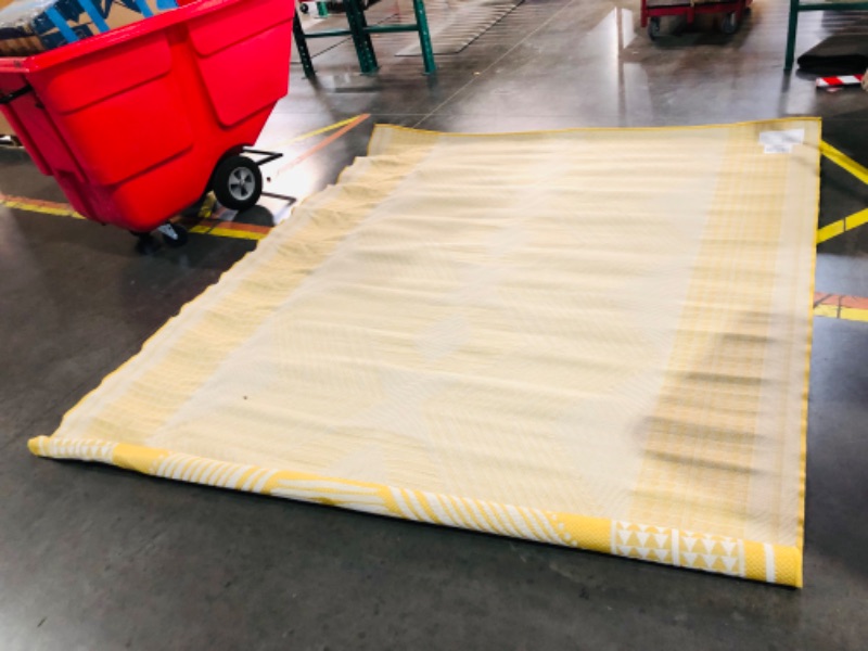 Photo 6 of ***HEAVILY USED - DIRTY - NO PACKAGING - SEE PICTURES***
nuLOOM 8' x 10' Outdoor Tribal Geometric Area Rug, Stain Resistant, Weather Resistant, High Traffic, Patio, Balcony, Outside, Yellow Yellow 8' x 10'