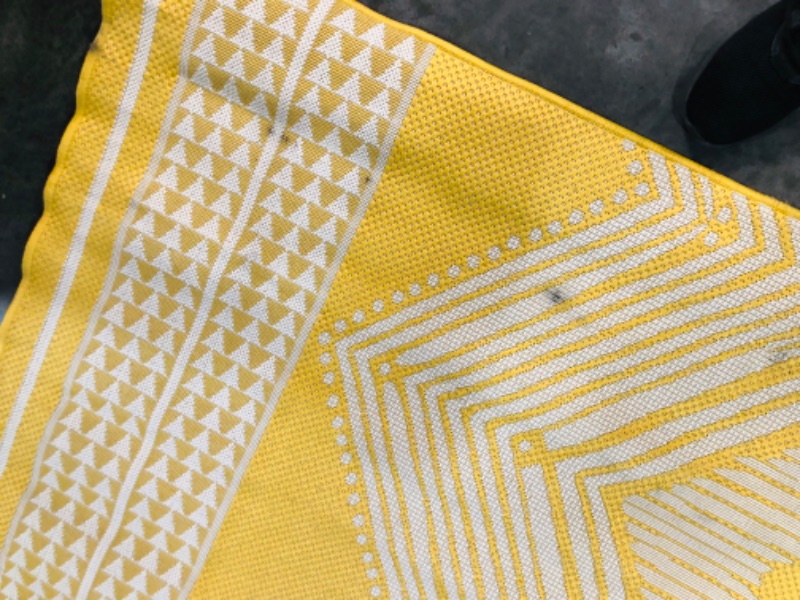 Photo 7 of ***HEAVILY USED - DIRTY - NO PACKAGING - SEE PICTURES***
nuLOOM 8' x 10' Outdoor Tribal Geometric Area Rug, Stain Resistant, Weather Resistant, High Traffic, Patio, Balcony, Outside, Yellow Yellow 8' x 10'