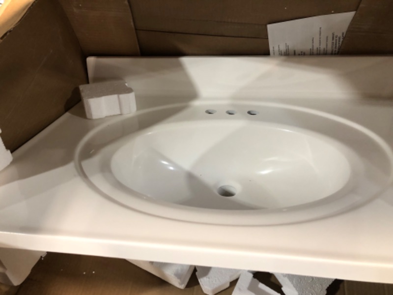 Photo 2 of 
Glacier Bay
31 in. W x 22 in. D Cultured Marble White Round Single Sink Vanity Top in White