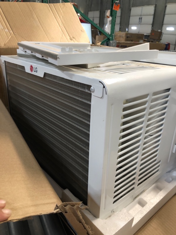 Photo 4 of (USED/ MAJOR DAMAGE) 
LG 8,000 BTU Window Air Conditioner, 115V, Cools 340 Sq.Ft. for Bedroom, Living Room, Apartment, Quiet Operation, Electronic Control with Remote, 3 Cooling & Fan Speeds, Auto Restart, White 8000 BTU Electronic & High Efficiency White