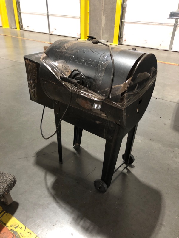 Photo 2 of **NONREFUNDABLE**FOR PARTS OR REPAIR**SEE NOTES**
Traeger Grills Tailgater Portable Electric Wood Pellet Grill and Smoker with Folding Legs