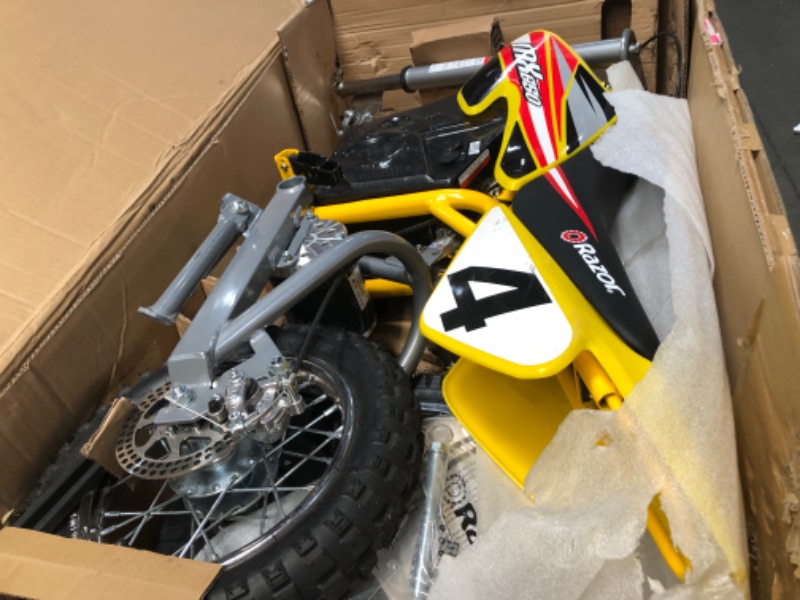 Photo 4 of Razor MX650 Dirt Rocket Electric-Powered Dirt Bike with Authentic Motocross Dirt Bike Geometry, Rear-Wheel Drive, High-Torque, Chain-Driven Motor, for Kids 13+
