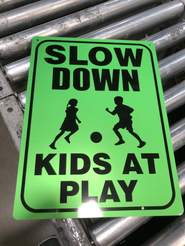 Photo 3 of 3 Pieces Slow Down Kids At Play Sign with Metal Stake, 12 x 16 Inch Kids At Play Safety Signs, Double Sided Child Safety Caution Signs, Children Sign for Street, Lawn Neighborhoods(Green, Slow Down) Slow Down Green