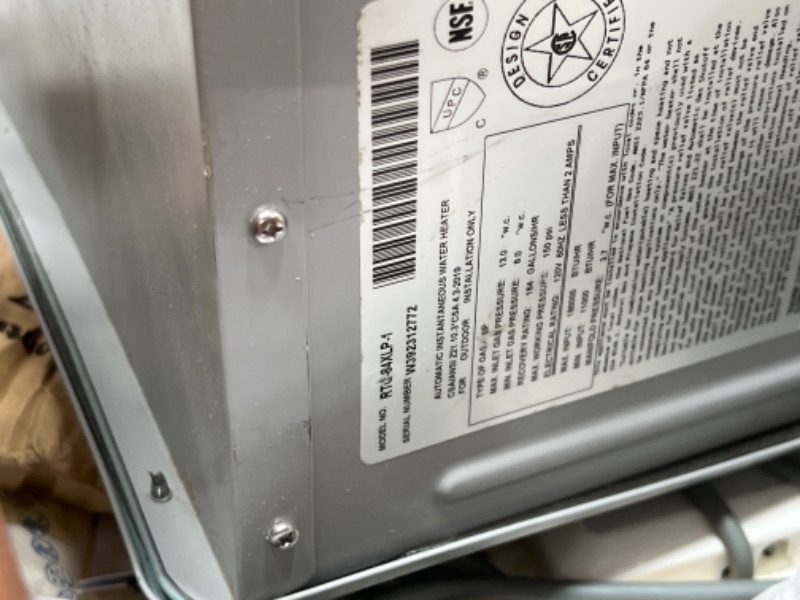 Photo 5 of **UNABLE TO TEST ITEM** [READ NOTES]**MISSING PARTS***MINOR DAMAGE***
Rheem Mid-Efficiency 8.4 GPM Outdoor Liquid Propane Tankless Water Heater