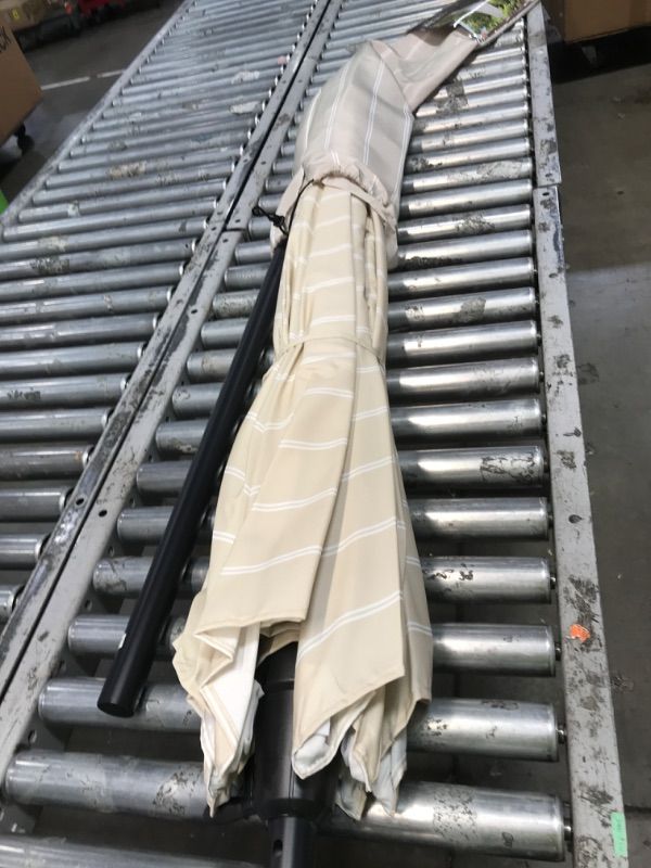 Photo 1 of allen + roth 9-ft Aluminum Tan Striped Auto-tilt Market Patio Umbrella 