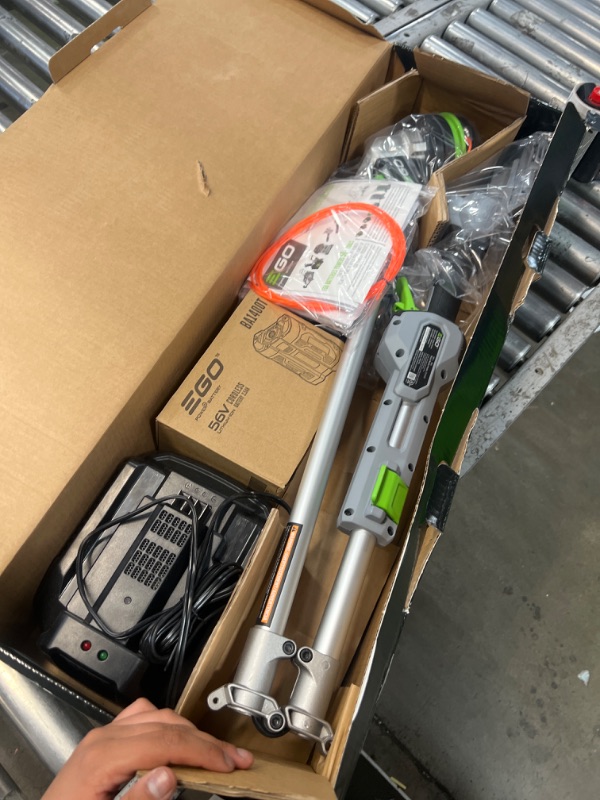 Photo 4 of ***(PARTS ONLY/ NONFUNCTIONAL/ NO RETURNS OR REFUNDS)***
EGO ST1511T 15-Inch 56-Volt Lithium-Ion Cordless String Trimmer Kit Alu Foldable Shaft Battery and Charger Included, 15in Powerload/Telescopic/Gauge(2.5AH), Black 15in Powerload/ Telescopic/ Gauge(2