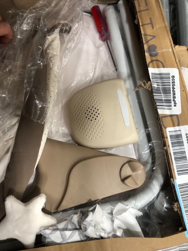 Photo 1 of Delta Children Rocking Bedside Bassinet - Portable Crib with Lights Sounds and Vibrations, Play Time Jungle