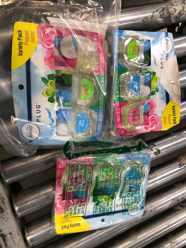 Photo 1 of 3 packs of Febreze Odor-Fighting Fade Defy PLUG Air Freshener, Downy April Fresh, Gain Original, Linen & Sky, (3) .87 fl. oz. Oil Refills
