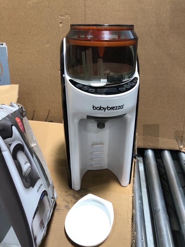 Photo 1 of Baby Brezza New and Improved Formula Pro Advanced Formula Dispenser Machine - Automatically Mix a Warm Formula Bottle Instantly - Easily Make Bottle with Automatic Powder Blending, White
