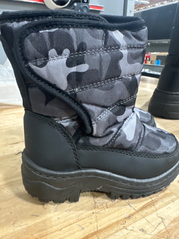 Photo 1 of Black camo winter boots 8