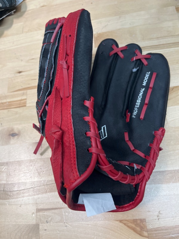 Photo 1 of left hand baseball mitt broken strings.