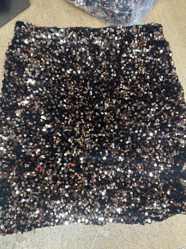 Photo 1 of  Women medium gold/ black sequence skirt