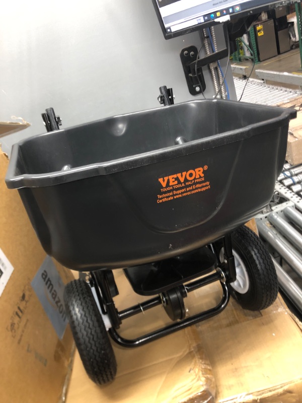 Photo 2 of VEVOR GT1606A Broadcast 60 LB Walk-Behind Turf 8" Wheels, Steel Push Fertilizer, Garden Seeder, and Salt Spreader, Designed for Residential, Farm, and Tough Terrain, Black