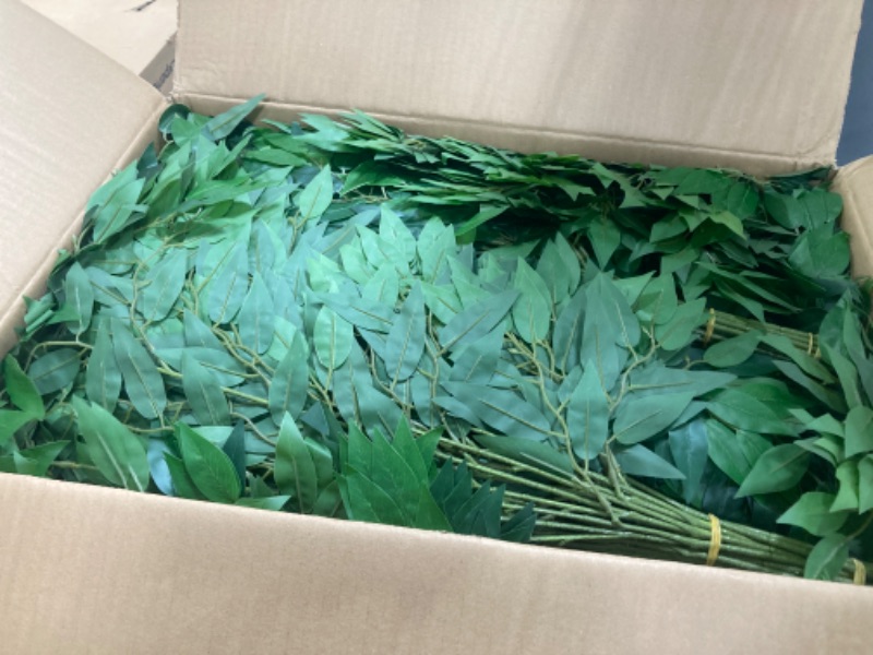 Photo 1 of  Artificial Italian Ruscus Greenery Stems 26.8 Inch Hanging Greenery Spray Fake Greenery for Centerpieces Faux Leaves Greenery Swag for Floral Arrangement Wedding Bouquet Garland Arch Home Decor