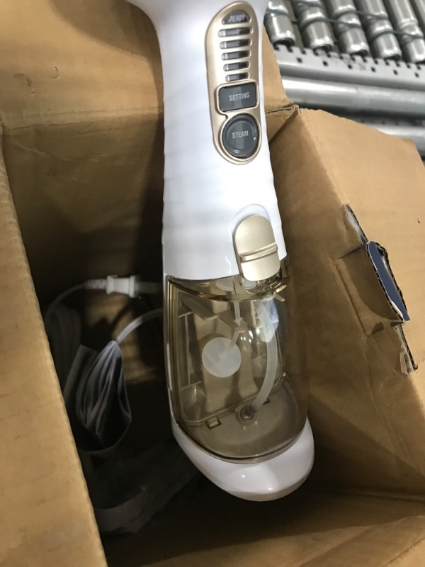 Photo 3 of Conair Handheld Garment Steamer for Clothes, Turbo ExtremeSteam 1875W, Portable Handheld Design, Strong Penetrating Steam, White / Champagne
