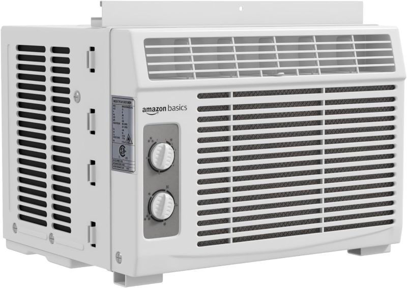 Photo 1 of (PARTS ONLY/ NO RETURNS OR REFUNDS/ SEE NOTES) 
Amazon Basics Window Mounted Air Conditioner with Mechanical Control Cools 150 Square Feet, 5000 BTU, AC Unit, White
