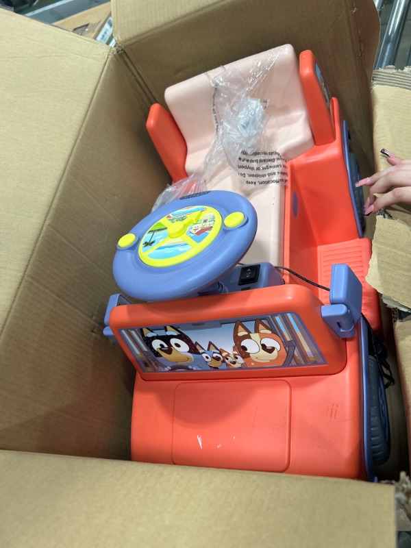 Photo 2 of Bluey 6V Ride On Car for Toddlers - Interactive Electric Car for Kids with Sound Effects & Music, Riding Toy for Boys & Girls, Includes 6V Rechargeable Battery & Charger