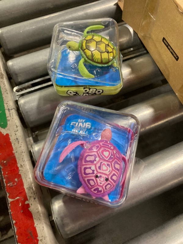 Photo 1 of *** FOR PARTS ONLY ** NO RETUNRS***
ROBO ALIVE Robo Turtle Robotic Swimming Turtle (Orange + Blue) by ZURU Water Activated, Comes with Batteries, Amazon Exclusive (2 Pack)