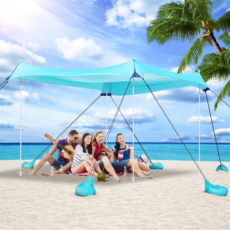 Photo 1 of Beach Canopy Tent Sun Shade - UPF50+ Protection Sun Shelter with 8 Sandbags, 10X10FT, includes Stability Poles and Big Ground Pegs, Pop Up Tent for Beach, Fishing, Camping, Picnic, Blue, 2024 Upgrade