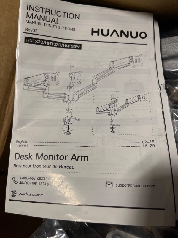 Photo 1 of HUANUO Triple Monitor Stand - Full Motion Articulating Gas Spring Monitor Mount Fit Three 17 to 32 inch Flat/Curved LCD Computer Screens with Clamp, Grommet Kit, Silver