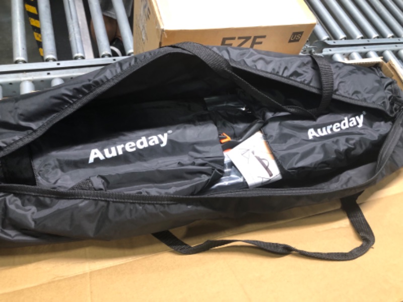 Photo 1 of Aureday Backdrop Stand, 10x7Ft Adjustable Photo Backdrop Stand Kit with 4 Crossbars, 6 Background Clamps, 2 Sandbags, and Carrying Bag for Parties/Wedding/Photography/Festival Decoration
