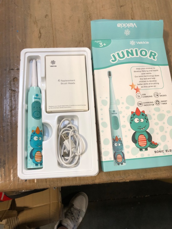 Photo 2 of ****USED*** Vekkia Sonic Rechargeable Kids Electric Toothbrush, 3 Modes with Memory, Fun & Easy Cleaning, 24000 Strokes, IPX7 Waterproof, 2-Min Timer for Age 3+, 4 Soft Bristles(Blue)