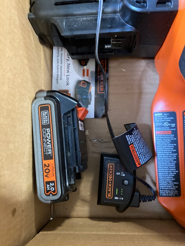 Photo 3 of **leaking oil inside box**BLACK+DECKER 20V MAX* Cordless Chainsaw Kit, 10-Inch (LCS1020) 20V Chainsaw Kit