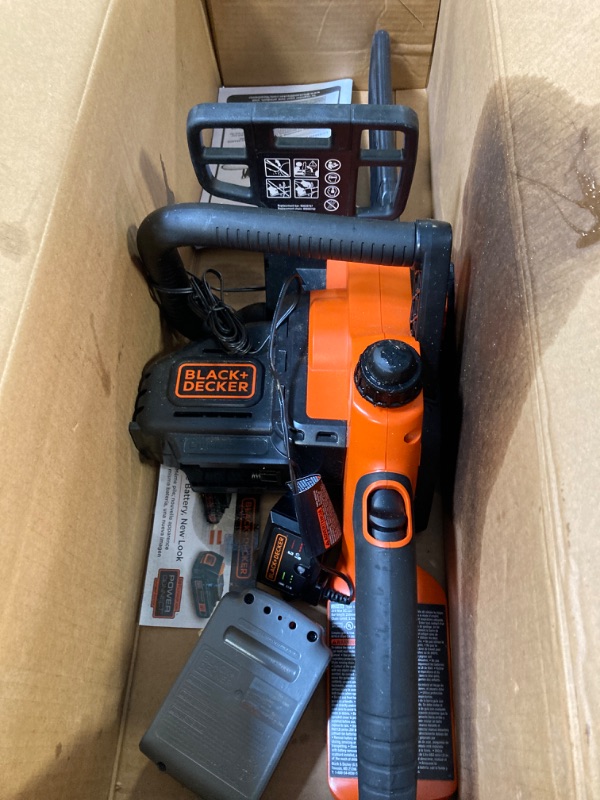 Photo 2 of **leaking oil inside box**BLACK+DECKER 20V MAX* Cordless Chainsaw Kit, 10-Inch (LCS1020) 20V Chainsaw Kit