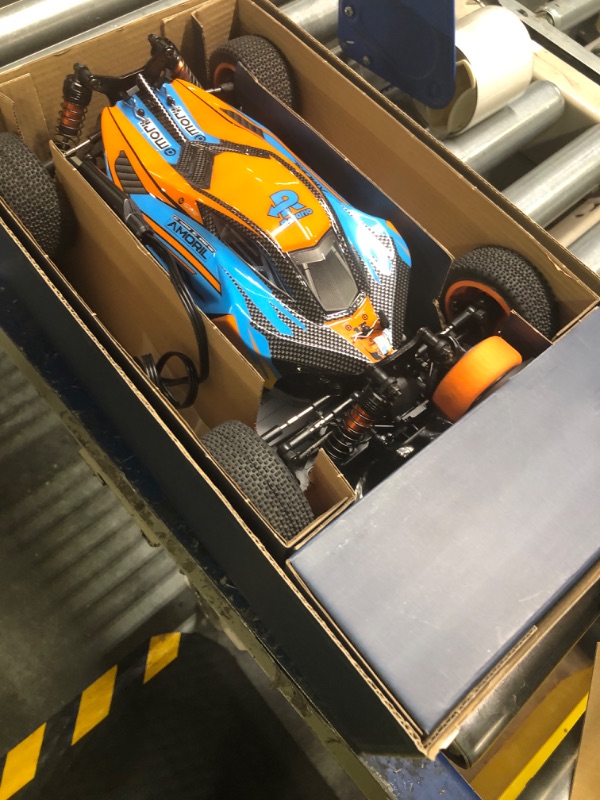 Photo 3 of AMORIL 1:12 Fast Brushless RC Cars for Adults,Top Speed 100KM/H Remote Control Car with Independent ESC,3200KV Brushless Motor,3.5KG Metal Servo,Foam Tire,Sway Bar and Metal Rod,Orange Teal 1:12 Metal Brushless