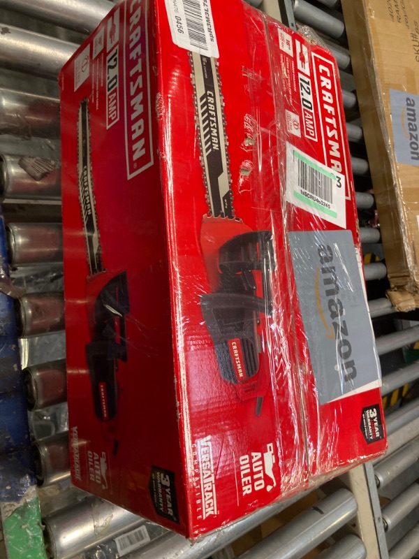 Photo 3 of ***The box is stained with oil, the product is used and dirty.*** CRAFTSMAN (CMECS600)Electric Chainsaw, 16-Inch, 12-Amp ,Red