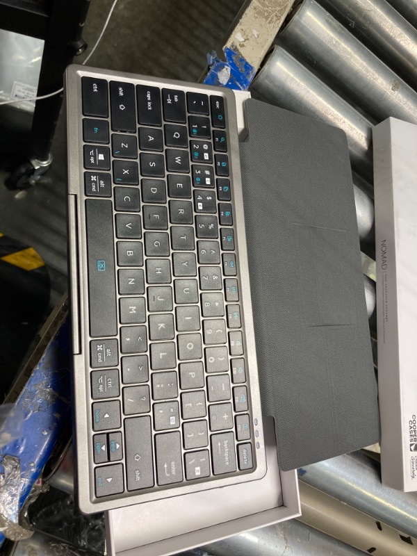 Photo 1 of Cooper Nomad Travel Keyboard with Trackpad | Full-Size Keys, Foldable Cover Stand, Multi-Device Compatibility for iPadOS, iOS, Android, Windows | Portable, Bluetooth Wireless Keyboard Touchpad (Black)