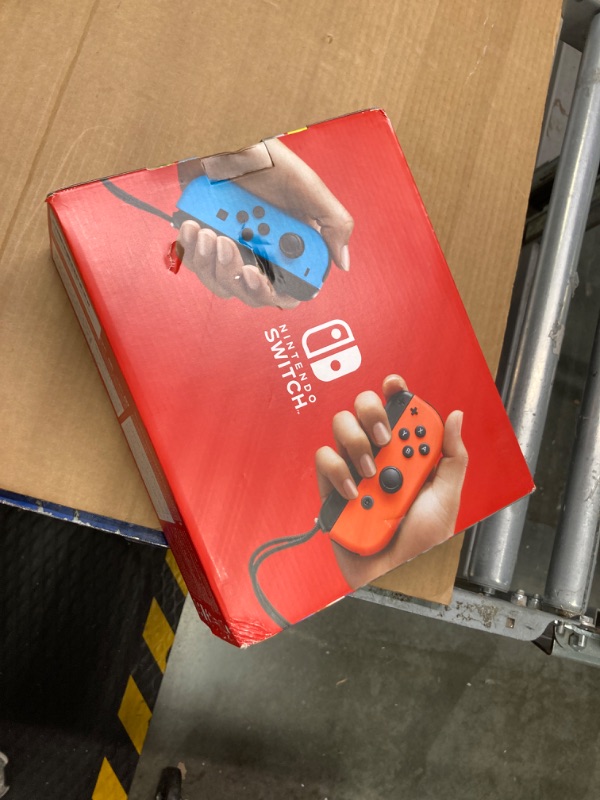 Photo 2 of Nintendo Switch™ with Neon Blue and Neon Red Joy?Con™ Console Neon